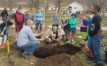 2018 Arbor Day tree planting with students at Ushers Ferry